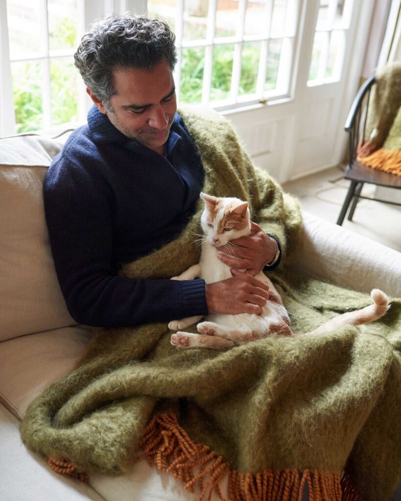 James Jayasundera and William the house cat at 7 Koppies, Franschhoek, South Africa