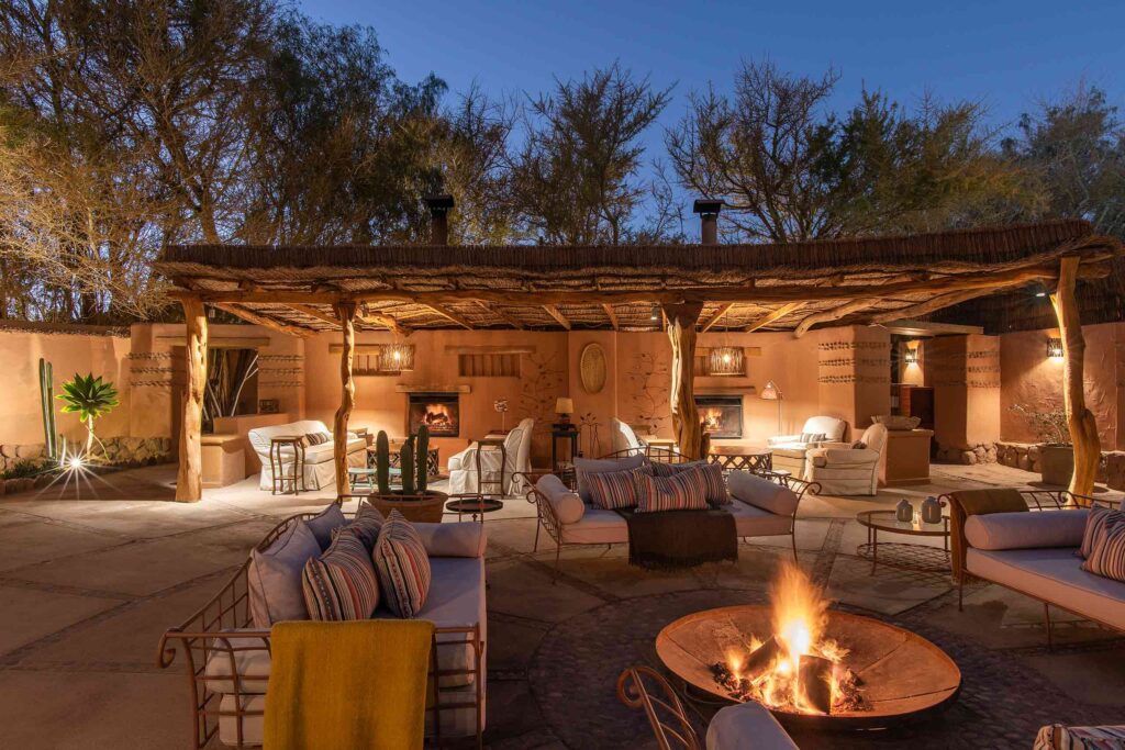 Fires burn at night at Awasi Atacama, San Pedro de Atacama, Chile