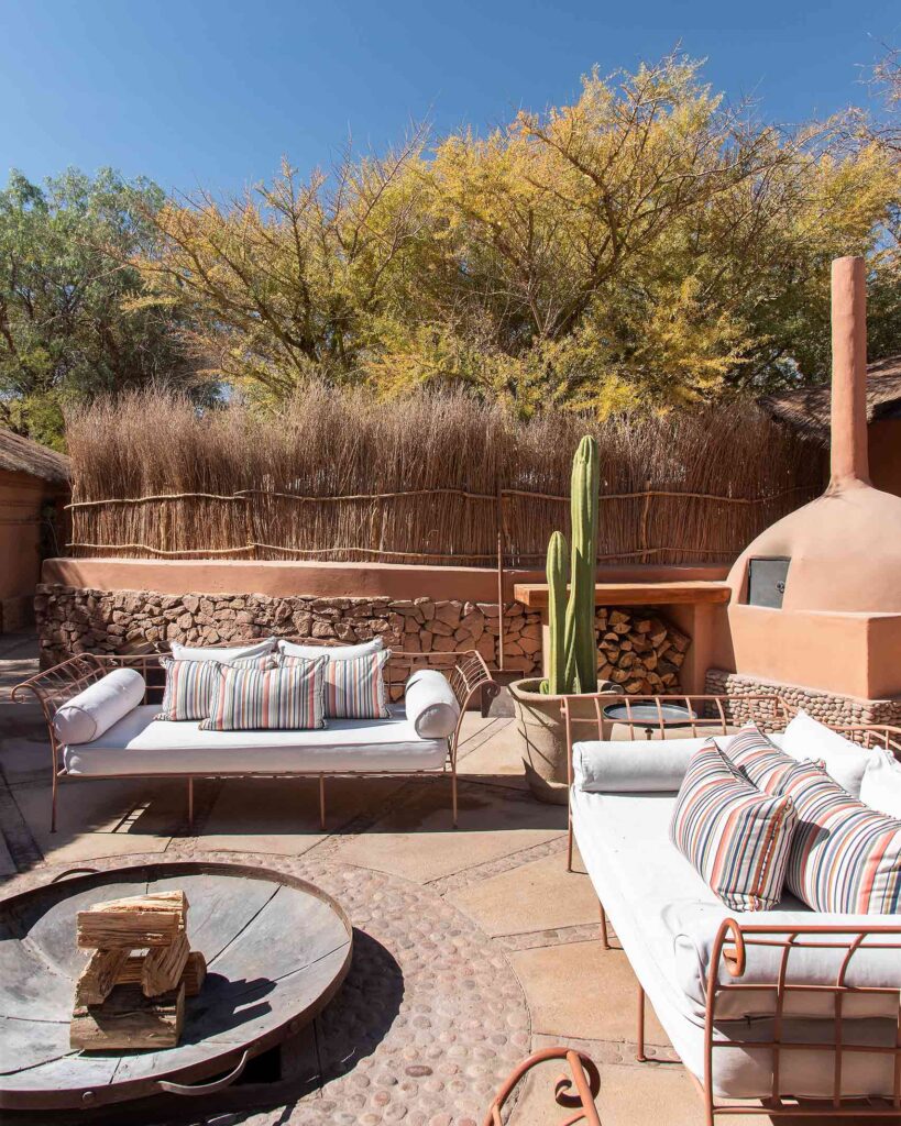 White upholstered outdoor sofas at Awasi Atacama, San Pedro de Atacama, Chile