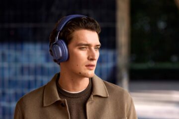 Model wears Indigo Blue Bowers and Wilkins Px7 S3