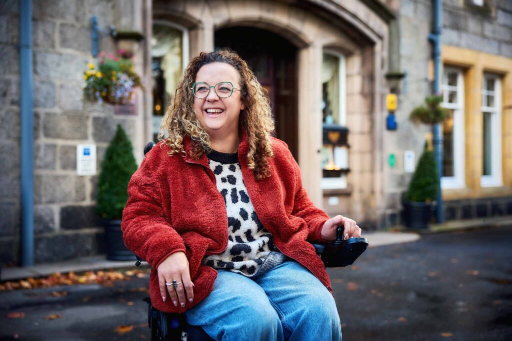 Disabled blogger Carrie-Ann Lightley smiles for the camera in Scotland