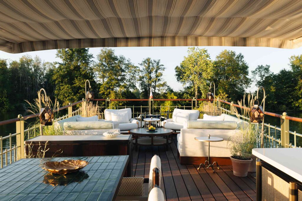 Seating area aboard one of the boats of Les Bateaux Belmond