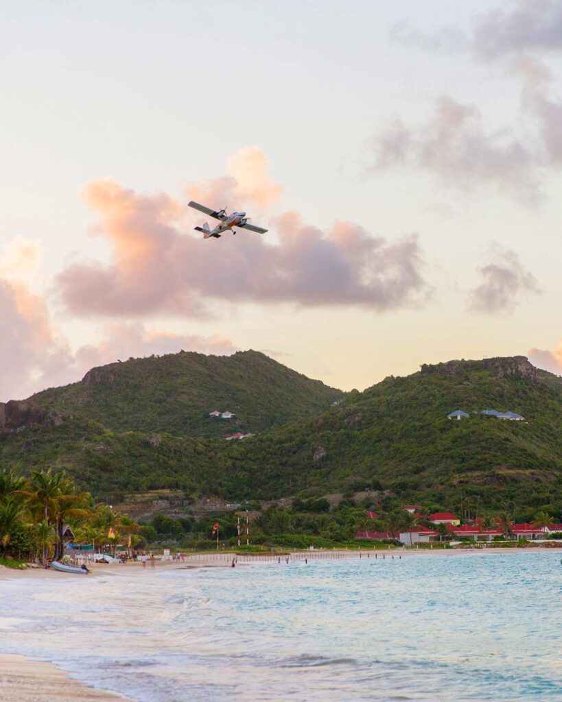 A small plane takes off, seen from Eden Rock St Barths, St Barts