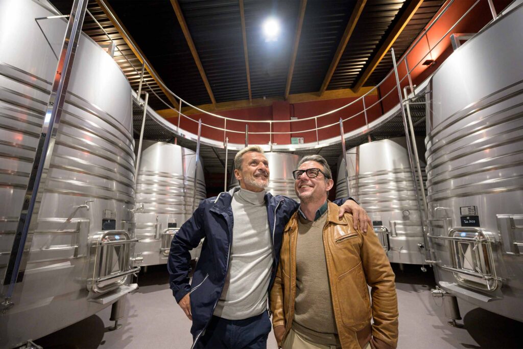 A gay couple explore a winery in Rioja.
