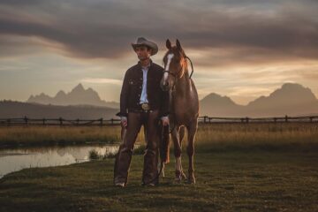Cowboy and his horse at Diamond Cross Ranch, Jackson Hole