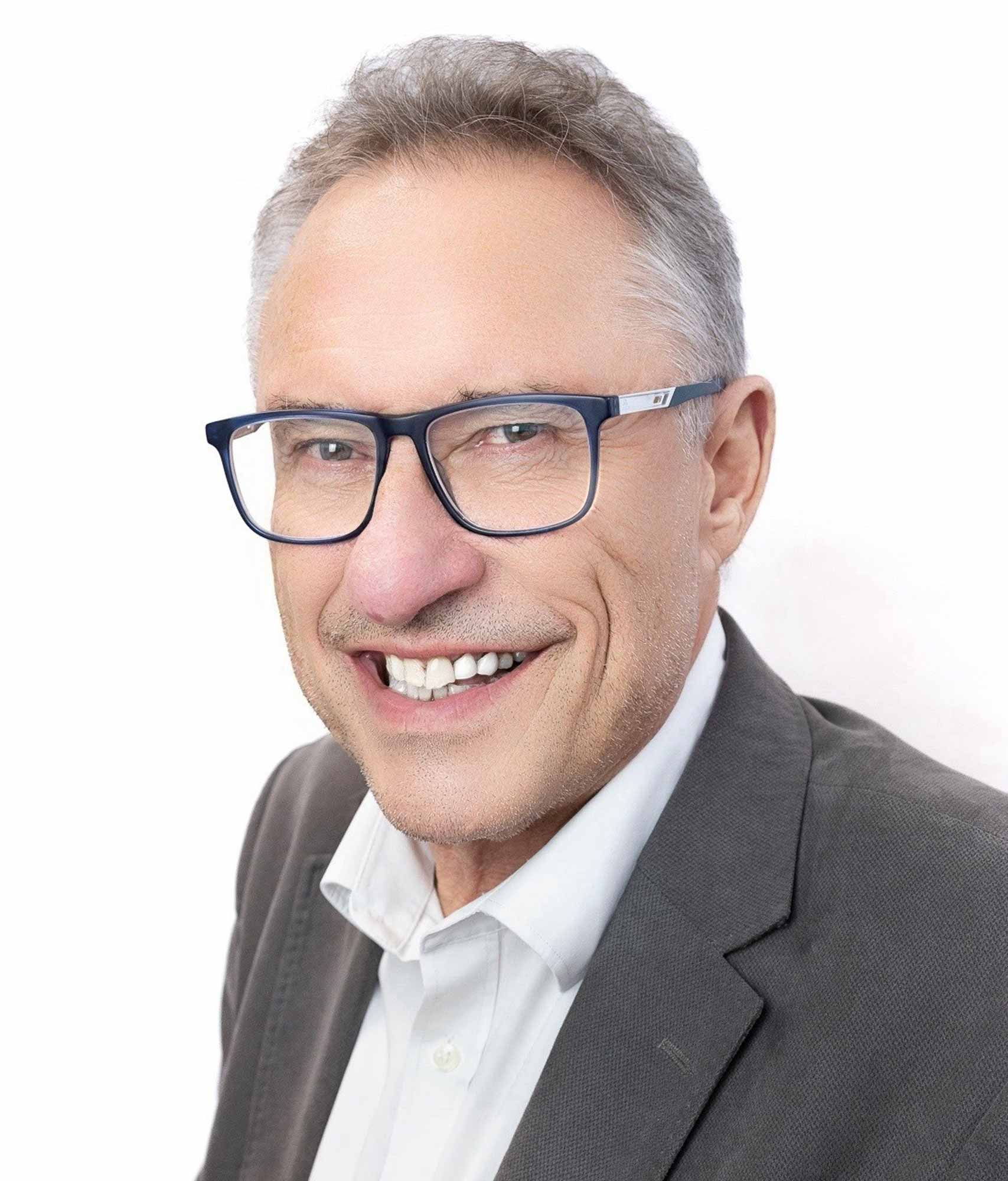 Portrait of Richard Thompson (he/him), CEO of Inclu Group