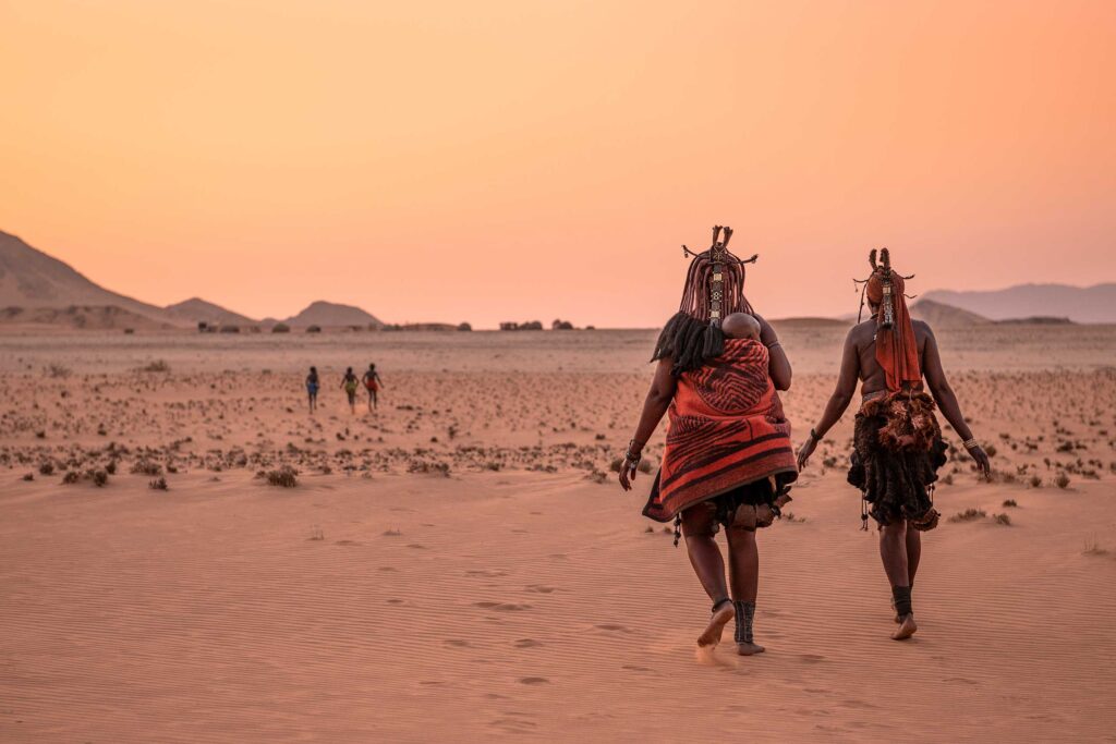 Two members of a local tribe in the Namibian desert